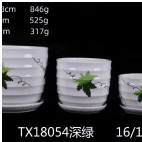 Ribbed with green maple leaf design ceramic planter